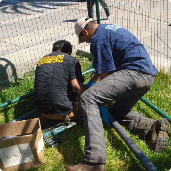 workers digging a hole